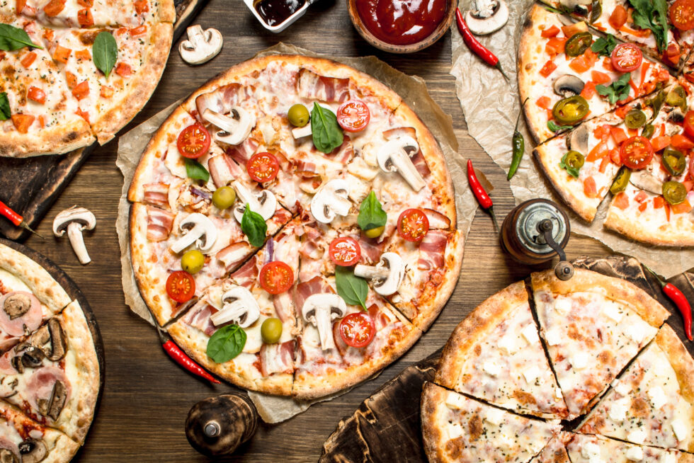 Varied pizzas with sauce